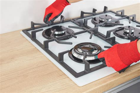 how to clean gas hob pan supports